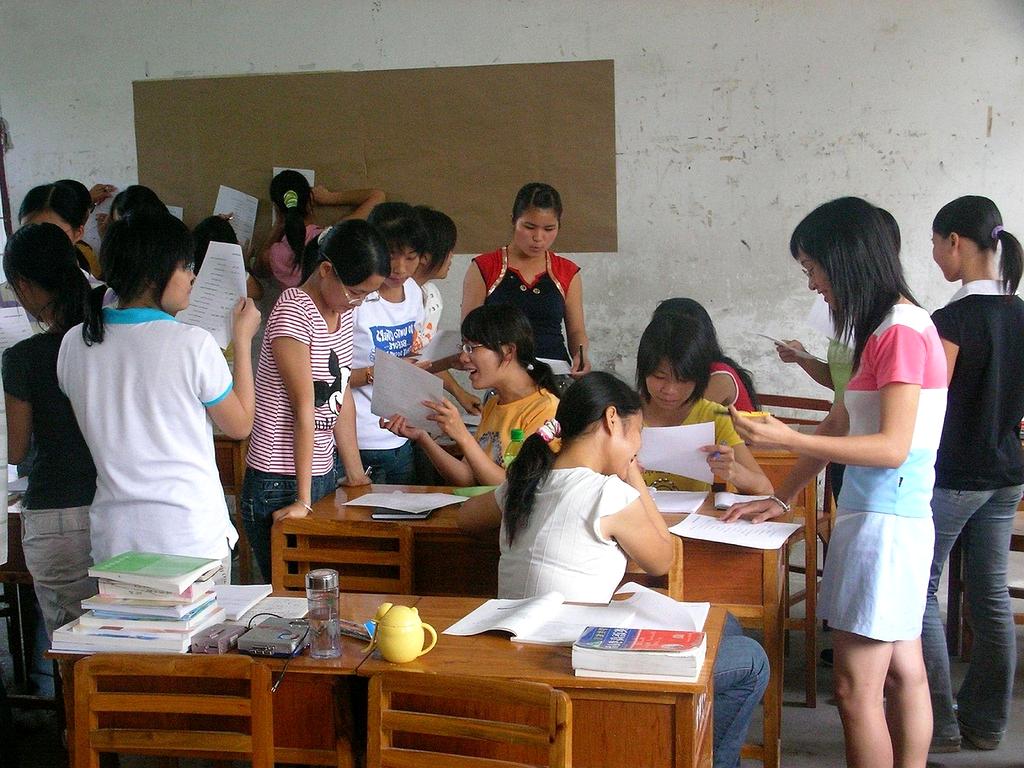 People collaborating and communicating in a modern educational environment